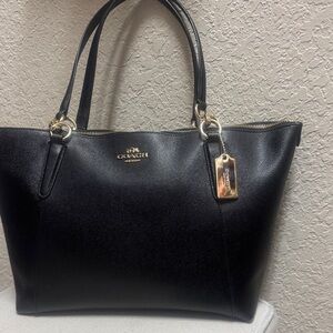 Like New, Coach vintage black coated canvas  large zip tote.
